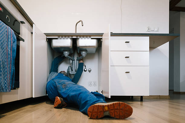Professional Emergency Plumber technician working in Menasha, WI